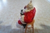 Picture of Santa Coca Cola Ornament- Santa Sitting On A Stoole enjoying A cold bottle of coke