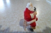 Picture of Santa Coca Cola Ornament- Santa Sitting On A Stoole enjoying A cold bottle of coke